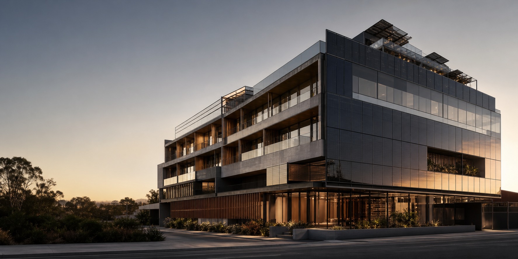 Illustrative commercial building with coordinated facade and roof energy elements